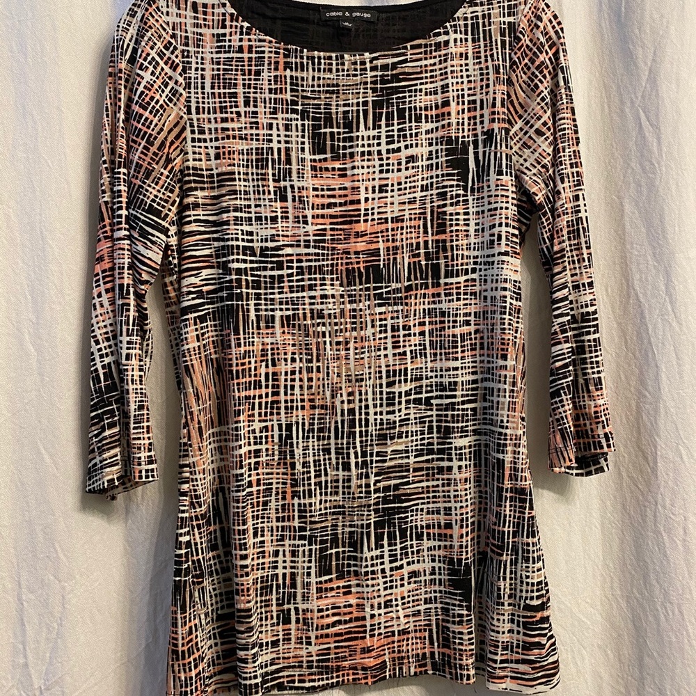 Long sleeved multi colored fancy shirt.